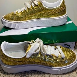 Gold sparkle pumas